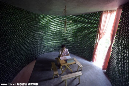 Architecture graduate builds his office out of 8,500 beer bottles
