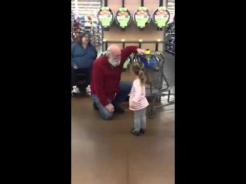 Little Girl Mistakes A Stranger For Santa And He Rolls With It