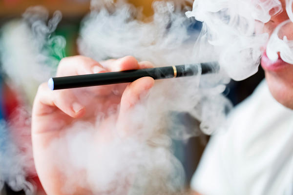E-Cigarettes likely encourage kids to try tobacco but may help adults quit