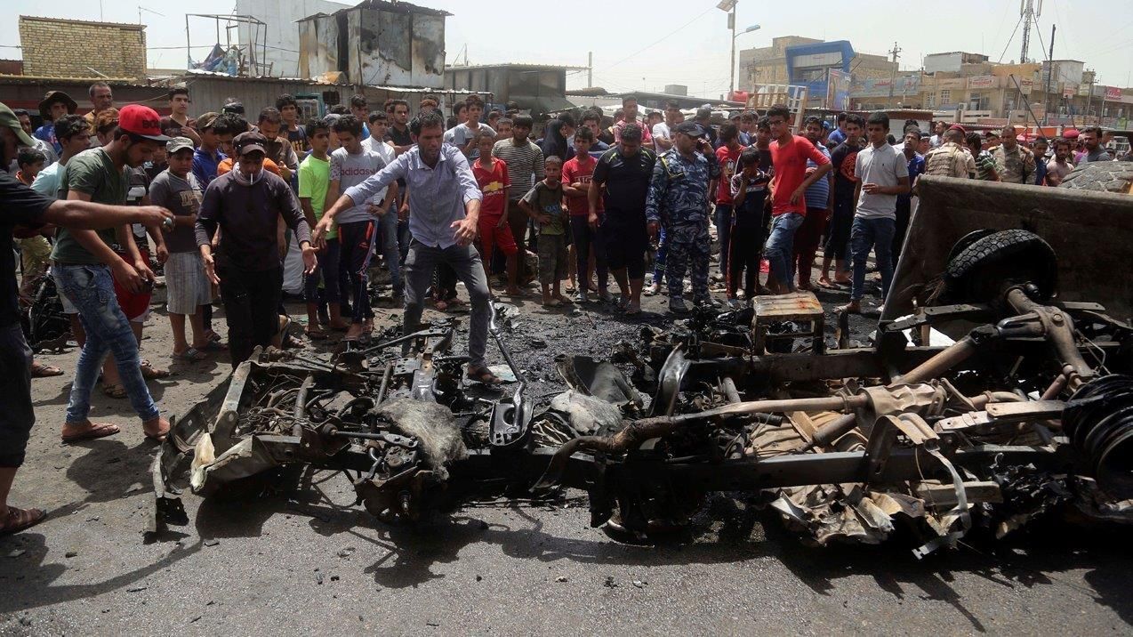 Car bombs target Baghdad shopping districts, 126 dead