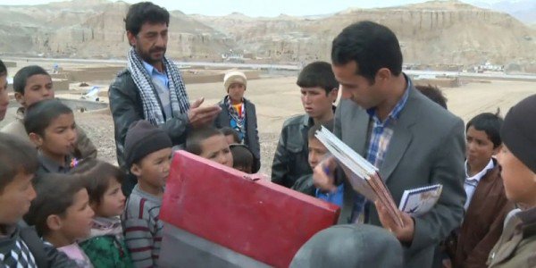 Afghan Teacher Turns His Bicycle into a Mobile Library to Give Isolated Children a Chance to Read
