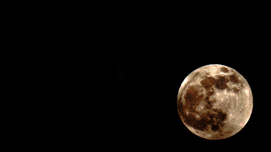 Why Friday's full moon is actually a blue moon, no matter its color